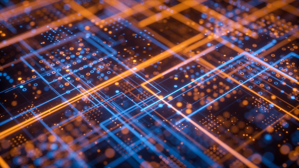 Abstract network of orange and blue light lines across a dark grid